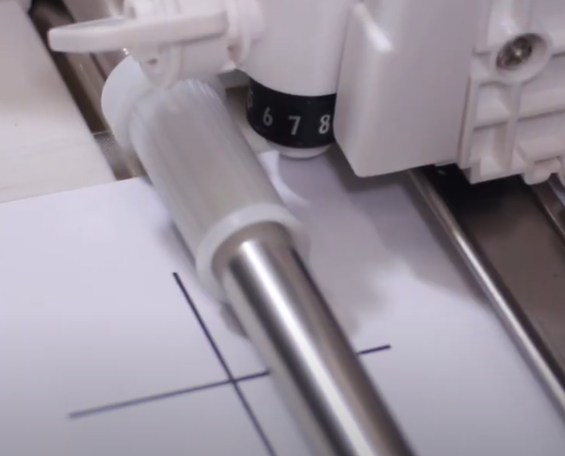 Push the Silhouette Cameo 3 calibrate button